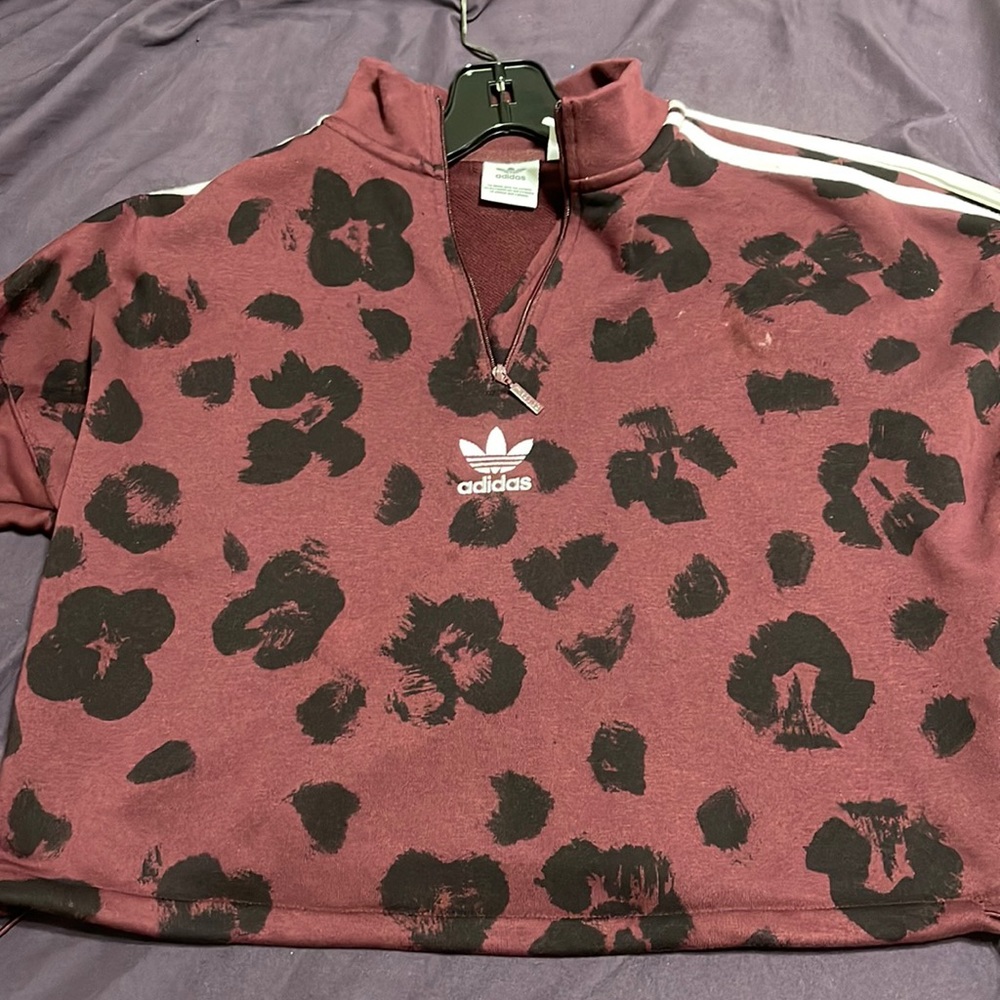 Collared adidas jacket in maroon w/ leopard print in medium.